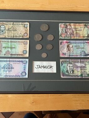 That’s a very nice shadow-box display of Jamaican currency.